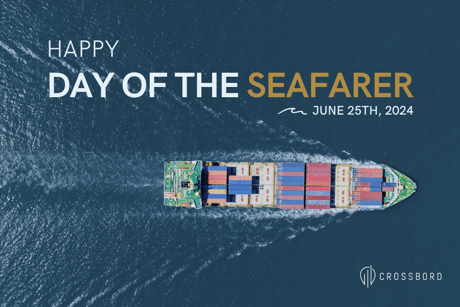 An aerial view of a large cargo ship at sea, commemorating the ‘Happy Day of the Seafarer - June 25th, 2024’, with the Crossbord logo displayed below.